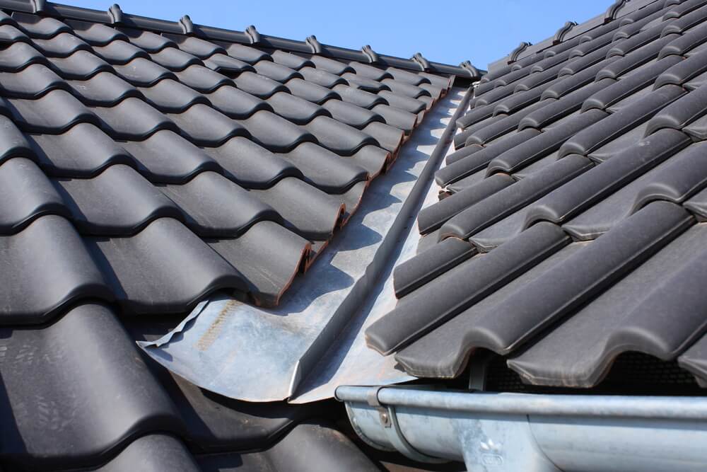 The roof is covered with black burnt roofing